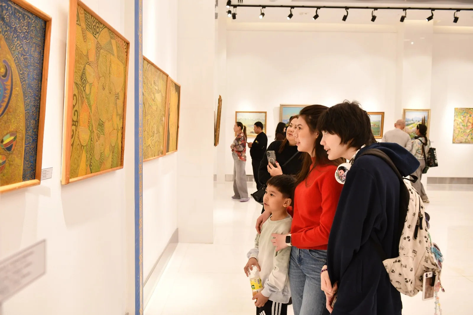 Visitors at a painting exhibition